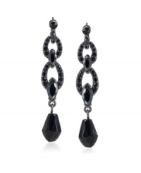 Let bold black earrings make a dramatic statement for you. This linear-style design by Carolee feature jet glass stones in multiple shapes and sizes. Earrings feature a double loop and dangling faceted teardrop. Crafted in hematite-plated mixed metal. Surgical steel posts. Approximate drop: 1-7/8 inches.