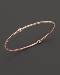 From the Rosé collection, a two-diamond hammered bangle. Designed by Ippolita.