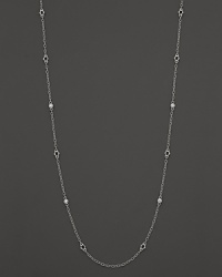 White sapphire stations shine on a sterling silver chain. From Judith Ripka.