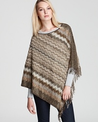 Metallic gold–hued threads woven into the signature zig-zag print give this Missoni poncho a chic sparkle.