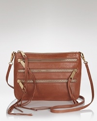 You've got the tough-girl attitude, now get a leather Rebecca Minkoff crossbody to match. Its shape is so night-now, its exposed zip details have serious bite.