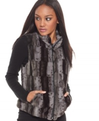 Feel like the diva you are inside with this fabulous, faux fur design from Cejon. Secure zip closure keeps you covered, while front slip pockets ensures hands stay warm and cozy.