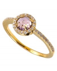 Stunning warmth. This elegant ring by CRISLU features an amethyst-colored, faceted cubic zirconia (5/8 ct. t.w.) accented by sparkling clear cubic zirconias. Set in 18k gold over sterling silver. Nickel-free for sensitive skin. Size 6, 7, and 8.