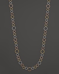 A tri-tone necklace in 18K white gold constructed of nautical cables, accented with diamonds. From Charriol.