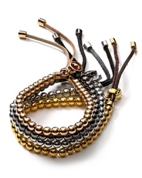 A chunky-chic take on the leather bracelet trend, MICHAEL Michael Kors' beaded bands are a boldly bohemian choice. Wear yours layered for maximal metallic impact.