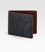 Taken from heritage suiting fabric, this wallet embodies a classic tailoring aesthetic and is French-edged with leather.One billfold compartmentSix card slotsCotton/leather4W x 4HImported