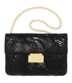 Sleek and chic, the Sloan clutch purse by MICHAEL Michael Kors also flaunts an optional chain strap.