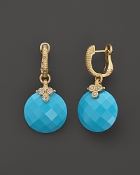 Round turquoise stones and diamond accents adorn these 18K gold earrings from Judith Ripka.