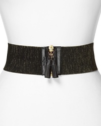 Cole Haan cinches your look this season with this zip-buckle belt, which stretches to contour your shape.