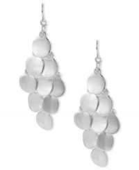 Shimmering circles create an elegant silhouette on these Kenneth Cole New York chandelier earrings. Crafted in silver tone mixed metal. Approximate drop: 2-3/4 inches.