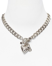 This shiny necklace is super cute with dangling iconic hearts with Juicy script and iconic J charm.