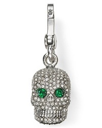 Pretty with a punk side. This Juicy Couture charm flaunts a macabre vibe, bedecked in crystals.