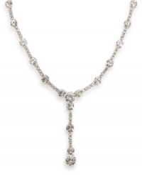 Shine like a star with this crystal-studded necklace by Carolee. Large and small crystals make a dramatic statement with a plunging Y-shaped pendant. Crafted in silver-plated mixed metal. Approximate length: 16 inches + 2-inch extender. Approximate drop: 1-3/4 inches.