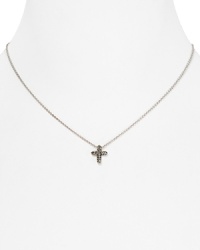 A cross-shaped pendant on this Judith Jack necklace offers a glittering focal point, with its delicate contours and crystals.