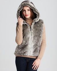 Statement-making style starts with this faux fur hooded vest from Surell.