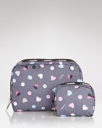 A set of nylon LeSportsac pouches define pretty-practical. And as for the print...we heart.