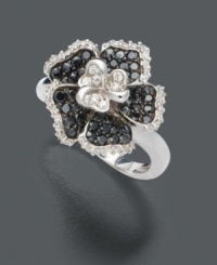 Take a departure from the ordinary. This diamond ring stands apart from the rest by featuring flower petals shimmering unexpectedly with round-cut black diamonds (1/3 ct. t.w.) and accents of round-cut white diamond (1/5 ct. t.w.). Ring crafted in sterling silver. Size 7.