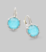 From the Eclipse Collection. A vividly colored, richly faceted turquoise sits in a sterling silver pronged setting with a graceful fluted texture. Turquoise Sterling silver Drop, about ¾ Diameter, about ½ Ear wire Imported