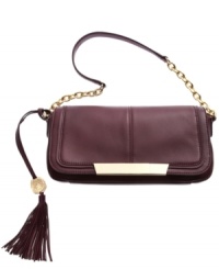 Add a little elegance to your everyday accessorizing with this posh purse from Vince Camuto. Luxe leather is outfitted with lady-like chain-link stations at the straps and shiny golden hardware that's at once eye-catching and understated. Inside offers plenty of room for essentials, like wallet, phone, keys and makeup.