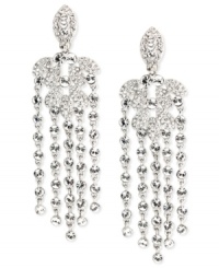 These flowing chandelier-shaped earrings by Givenchy are the perfect addition to special occasion looks. They flaunt linear drops of glass pearl and shimmering crystals. Crafted in silver tone white mixed metal. Approximate drop: 3-1/2 inches.