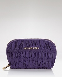 MICHAEL Michael Kors quilted cosmetics case makes a beautiful addition to your luggage collection or home vanity.