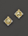 Cushion-cut canary crystals give these sterling silver posts timeless appeal.