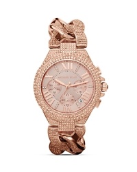 Bright, all-around crystals frame a tony, rose gold plated Michael Kors watch. Styled for as a true statement piece - it is one of our favorite ways to add a touch of modern glam to any ensemble.