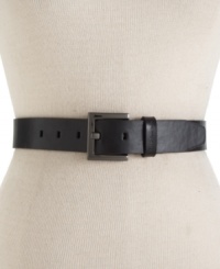 A rich, leather belt with gunmetal hardware and logo-embossed loop gives you a leg up on the competition. By Calvin Klein.