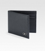 Single fold wallet rendered in luxuriously textured, Italian calfskin leather with double gancini silver ornament accent for a signature finish.One bill compartmentSix card slotsLeather4W x 3HMade in Italy