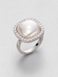 A modern look, offering a lustrous white, organic manmade mabé pearl surrounded by twinkling cubic zirconia in a beaded setting of polished sterling silver.15mm white, square organic, manmade mabé pearlCubic zirconiaSterling silverAbout 1 squareMade in Spain