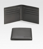 A classic leather bi-fold wallet with cut-out logo detail. Two bill compartments Six card slots 4.3W X 3.5H Made in Italy 