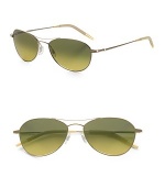 A revised look for the classic aviator style, designed with double-bridge detail and metal frames. Available in gold frames with gradient peridot lenses. 100% UV protective Imported 