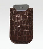 A sleek and compact case in croco-embossed leather, specially designed for iPhones 4 and 4S models and newer BlackBerry models. Shammy-cloth lining securely hold your phone in place. Fits iPhone 4/4S and new BlackBerry models Leather 3½W X 5H Made in USA 