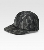 A sporty baseball cap crafted in camouflaged nylon with tonal colors and contemporary appeal. Stitched brim Made in Italy