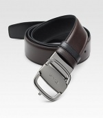 Sleek reversible design rendered in Italian leather, finished with an adjustable signature vara buckle.CalfskinRuthenium buckleAbout 1½ wideMade in Italy