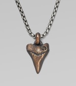 A shark's tooth pendant is handsomely craft, lending to lend a new look to any man's collection. From the Small Amulet Collection Titanium Bronze 2.7mm box chain length, 22 Lobster clasp Imported 