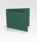 Inspired by leather detailing of vintage sports cars, monza leather is a combination of flat and perforated calf leather with a matte finish. Debossed logo detail Six card slots Two pocket sleeves 4W X 3½H Imported 