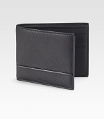 An elegant accompaniment in pebbled leather with a debossed logo and thin narrow detail. One bill compartmentSix card slots4¼W X 3½HMade in Italy