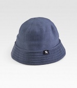 A soft cotton knit design with a bell silhouette and a ribbed brim. Hand wash Imported