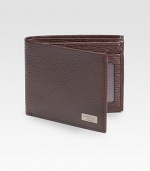 Stamped calfskin wallet with five credit card slots, two currency departments and one ID window. 4½W X 3½H Made in Italy