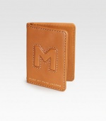 Stitch detail adds character to this slim design, in initial-embossed leather.One ID windowThree card slotsLeather3W x 4H x 2½DImported