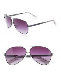 THE LOOKAviator style Metal framesBrow barAustrian crystal temple accentsUVA and UVB protection Signature case includedTHE COLORHematite with violet gradient lensesORIGINImported