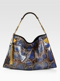 Elegantly redefined, this python shoulder bag embodies true '70's glamour. Hand colored by expert craftsmen, each version of this bag is unique.Periwinkle pythonAntique gold hardwareChain shoulder strap with leather detailMagnet snap closure on topInside zip, cell phone, and PDA pocketsNatural cotton linen liningMedium size: 17.3L x 1.4W x 11.4HMade in Italy