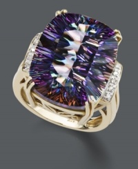 Capture a myriad of colors all in one beautiful cocktail-style ring. Crafted in 14k gold, a large mystic topaz gemstone (11 ct. t.w.) is decorated at the sides by sparkling diamond accents.