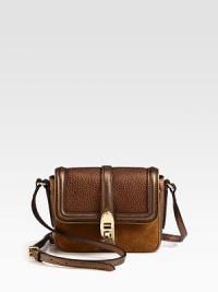 A rich mix of metallic pebbled leather and soft suede in a chic crossbody design.Adjustable leather shoulder strap, 20-23 dropTurnlock flap closureFive credit card slotsFully lined6½W X 5H X 2DImported