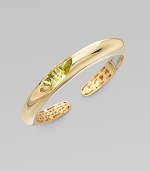 EXCLUSIVELY AT SAKS. A rounded, slim piece with an oval center stone. 18k gold Lemon quartz Slip-on style Length, about 7 Made in Italy 