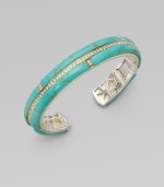 Sparkling, white sapphires and 18k goldplated sterling silver add interest to this stunning, turquoise section design. Turquoise18k goldplated sterling silverDiameter, about 3Slip-on styleImported 