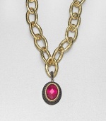 From the Laguna Collection. A pretty, faceted fuchsia quartz center set in 18k gold and sterling silver accented with three rows of rich black spinel. Fuchsia quartz18k goldSterling silverBlack spinelSize, about 1.33Black spinel accented baleImported Please note: Chain sold separately. 