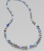 From the Elements Collection. A long-enough-to-double strand combines beads of sterling silver, blue chalcedony, aquamarine and moon quartz in an artful array of textures, sizes and shades.Blue chalcedony, aquamarine and moon quartzSterling silverLength, about 36Cable toggle claspImported