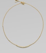 A delicate style featuring a curved bar encrusted in sparkling rhinestones on a link chain. Goldtone brassGlass stonesLength, about 16Toggle closureImported 